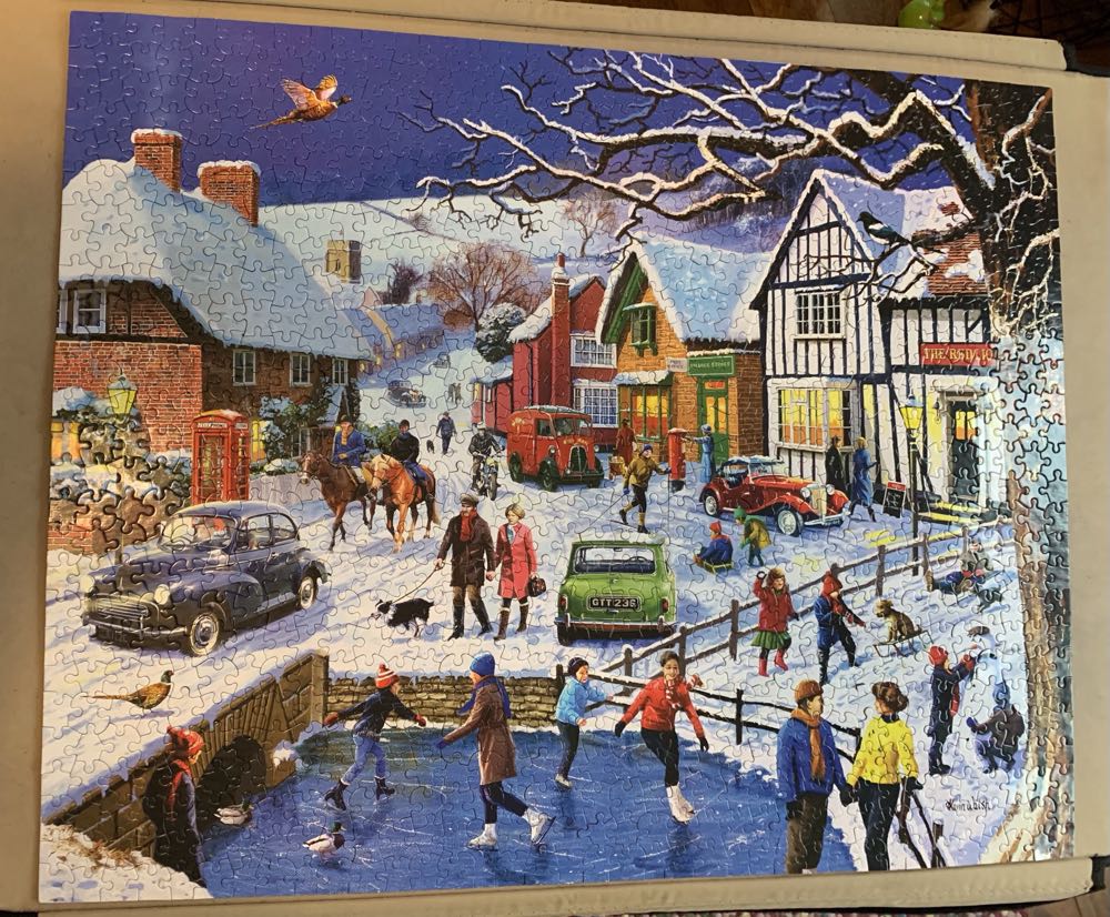 Festive Village( TRAVELING PUZZLE ) - White Mountain Puzzles puzzle collectible - Main Image 2