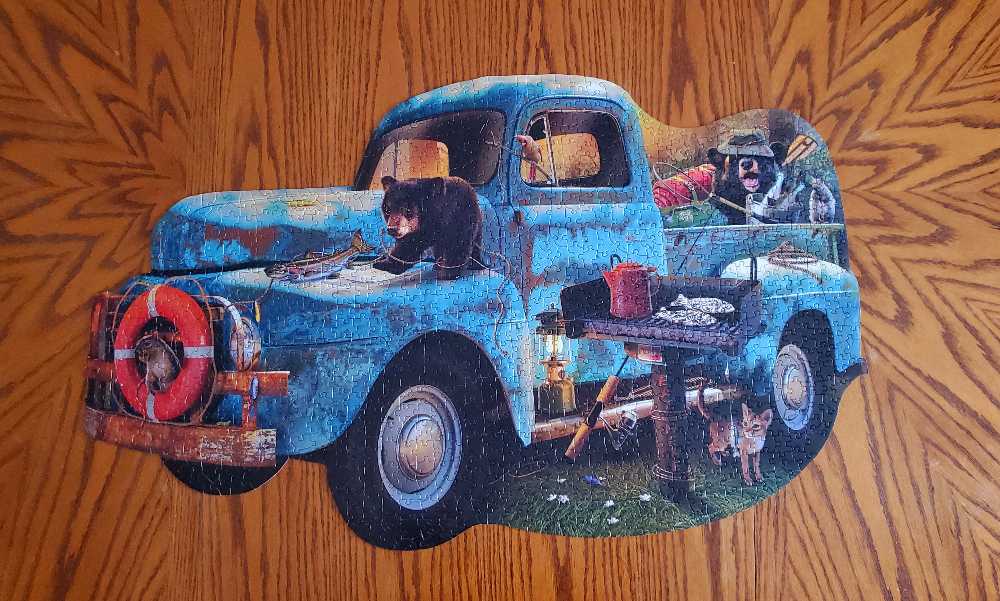 The Blue Truck (Worked) - SunsOut puzzle collectible [Barcode 796780970328] - Main Image 2
