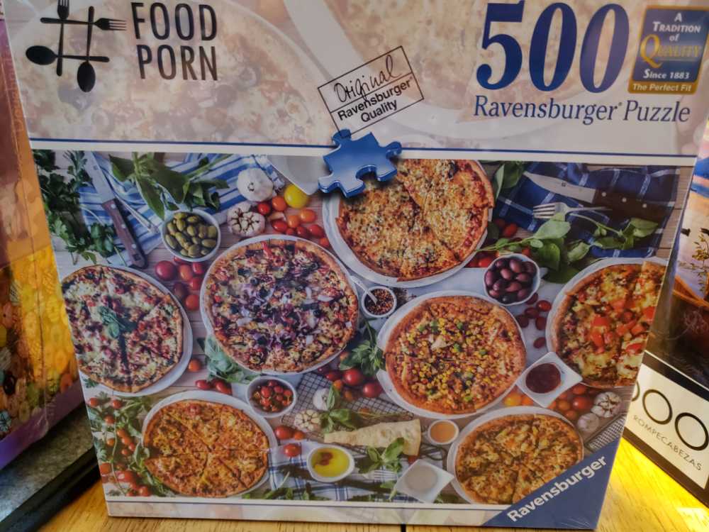 Dogs In A Cottage Garden