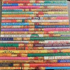 Tabby Kitten Sleeping In Bowl And Pile Of Fabric Hearts