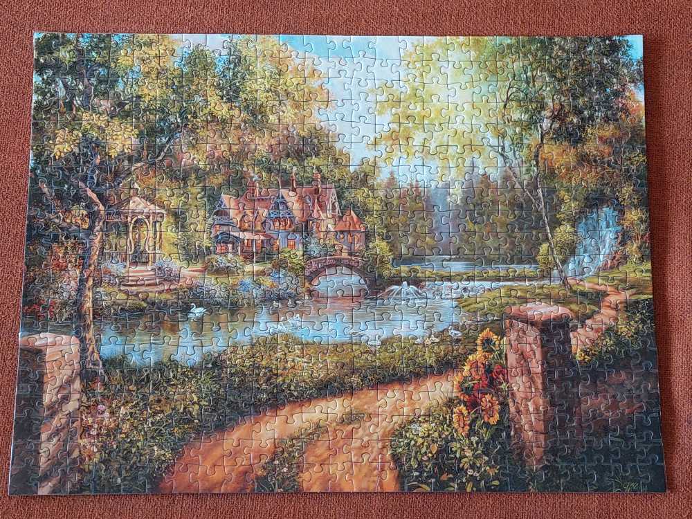 Cottage By The River - Ravensburger puzzle collectible [Barcode 4005556165827] - Main Image 2