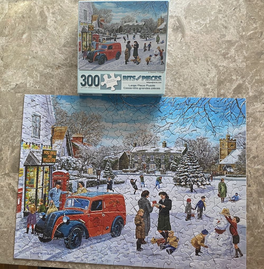 A Snowy Village - Bits & Pieces puzzle collectible [Barcode 192949046789] - Main Image 2