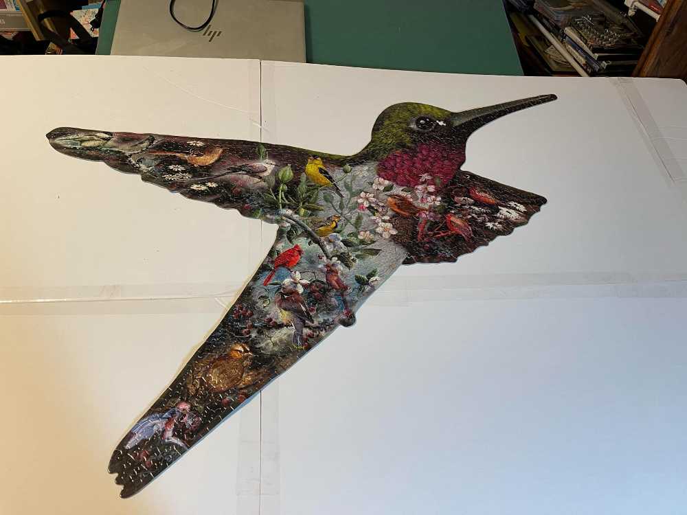 A Flicker Then Gone - Serendipity Puzzle Company puzzle collectible [Barcode 890061000176] - Main Image 2