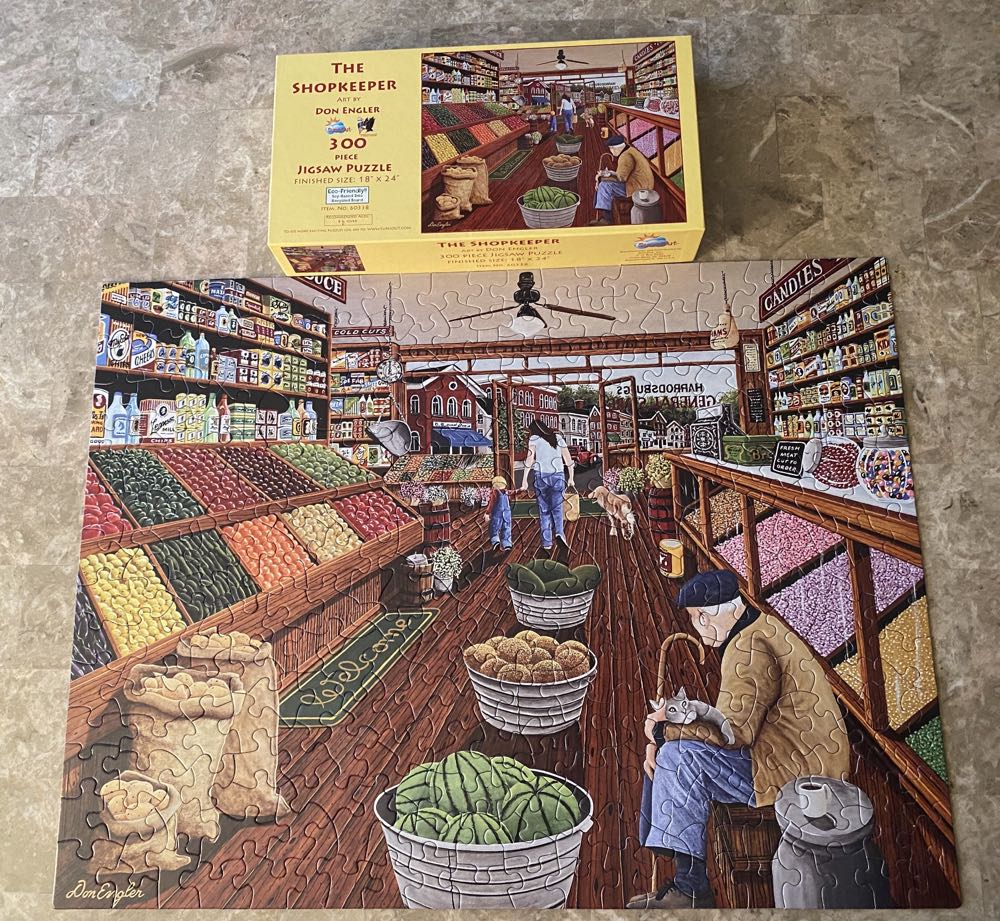 The Shopkeeper - SunsOut puzzle collectible [Barcode 796780603387] - Main Image 2
