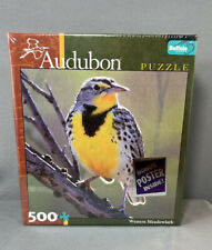 Kitty And Flowers Against A Prussian Blue