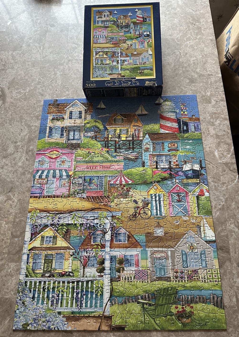 Village By The Sea - Pastime Puzzles puzzle collectible [Barcode 714043071100] - Main Image 2