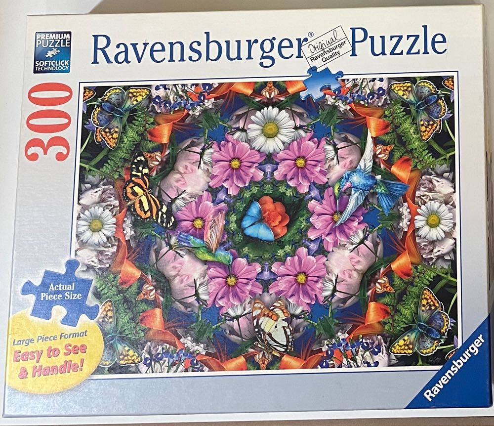 Flower Kaleidoscope • - Ravensburger puzzle collectible [Barcode 4005556135554] - Main Image 1