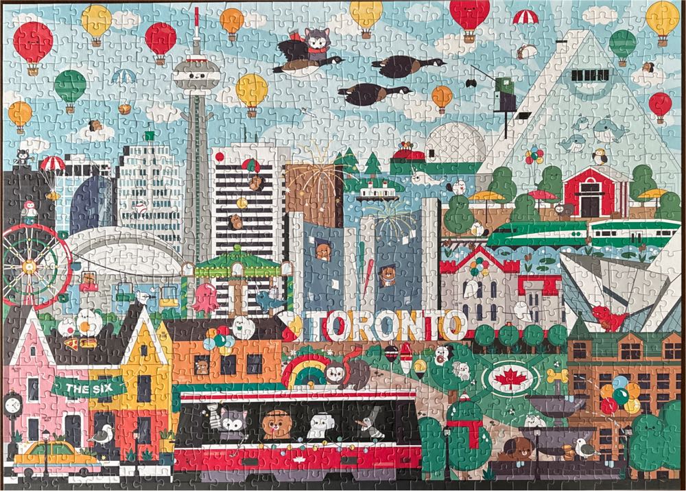 Toronto In Motion - Arcadia Puzzles puzzle collectible [Barcode 627987938272] - Main Image 2