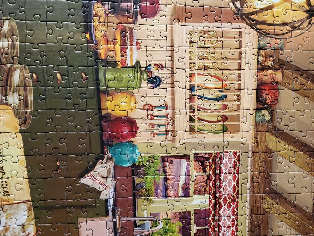 Cozy Kitchen (Artiest) - Ravensburger puzzle collectible [Barcode 4005556169429] - Main Image 3