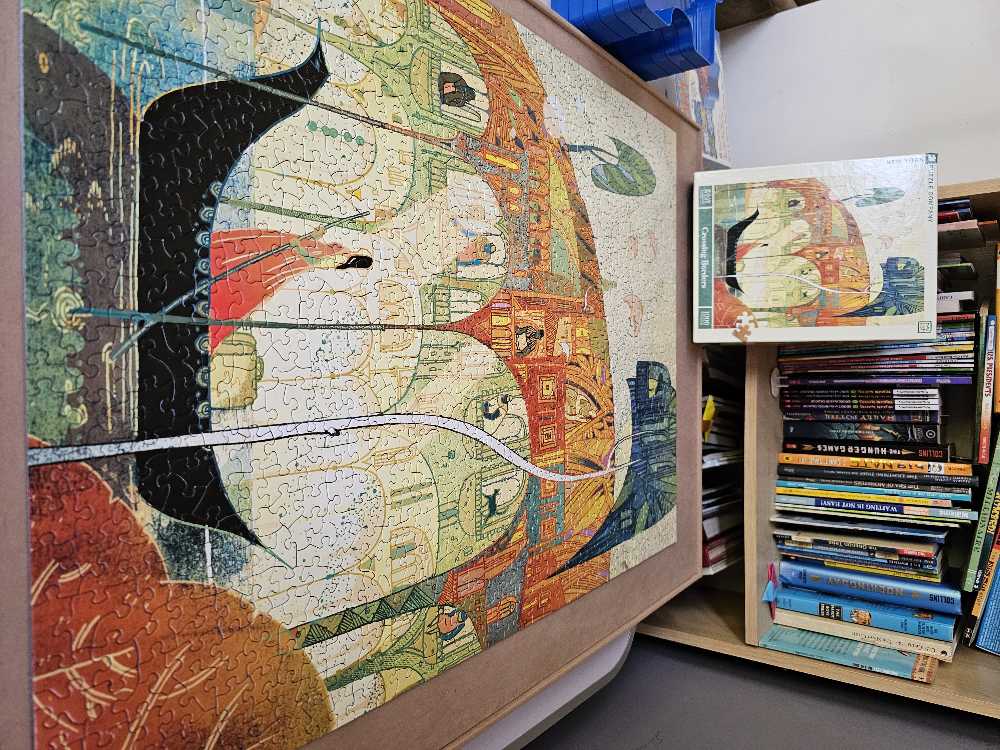 Crossing Borders - New York Puzzle Company puzzle collectible [Barcode 840291701060] - Main Image 2