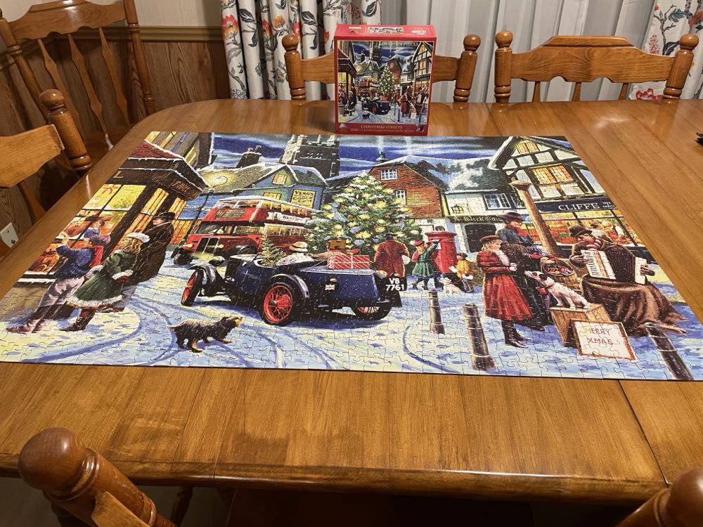 Christmas Streets - SunsOut puzzle collectible [Barcode 796780136977] - Main Image 2