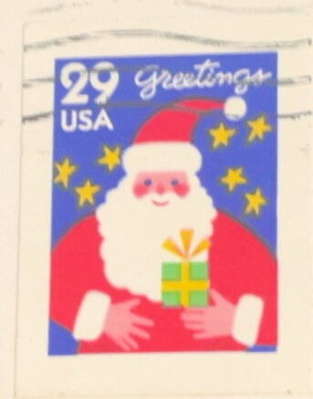 Contemporary Christmas: Santa With Present  stamp collectible - Main Image 2
