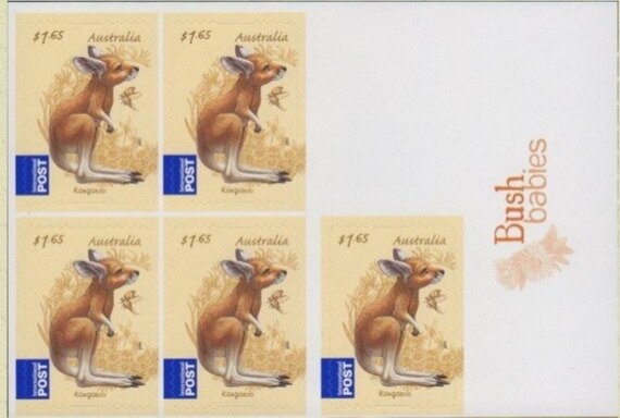 Rod Laver with Wimbledon Trophy