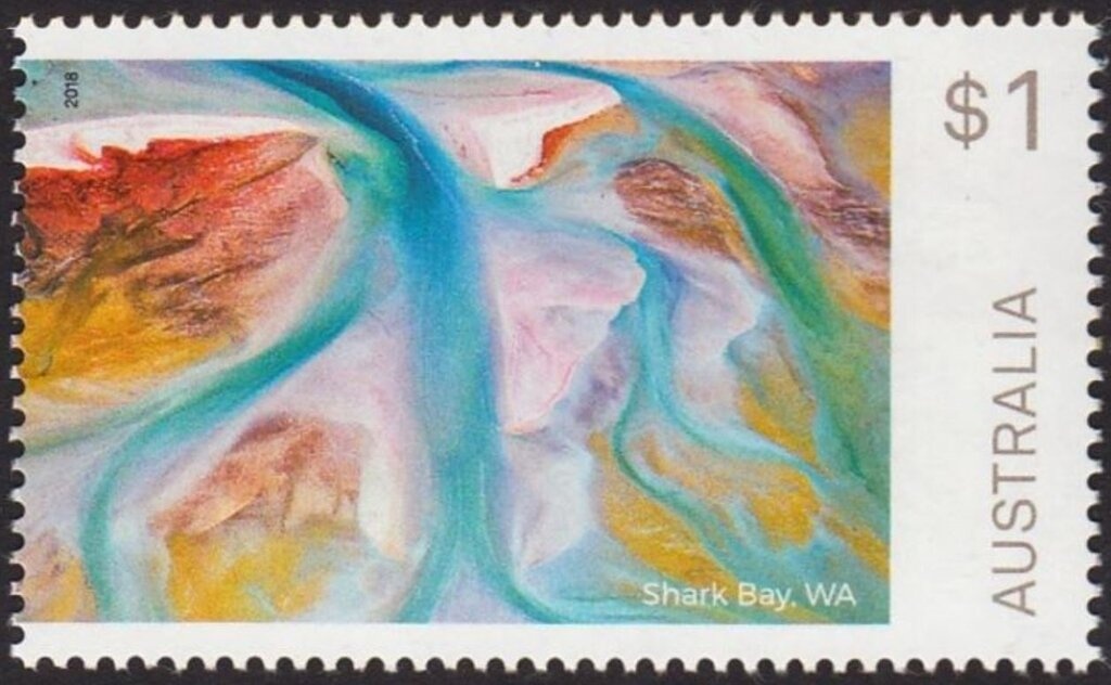 Surfer on Crest of Wave