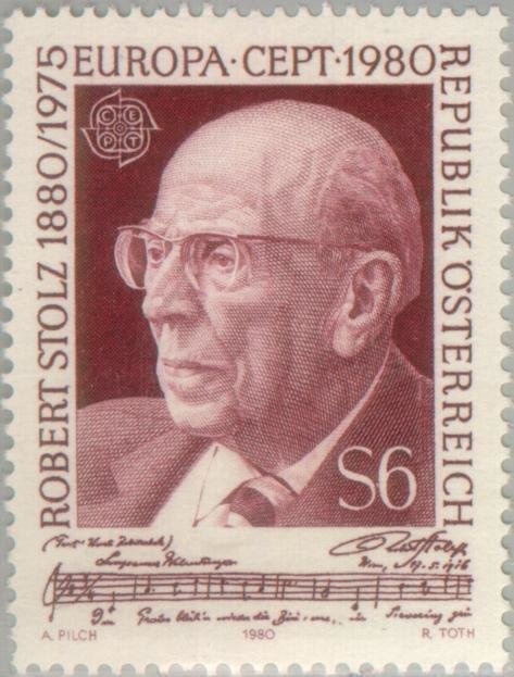 Mother in front of barbed wire