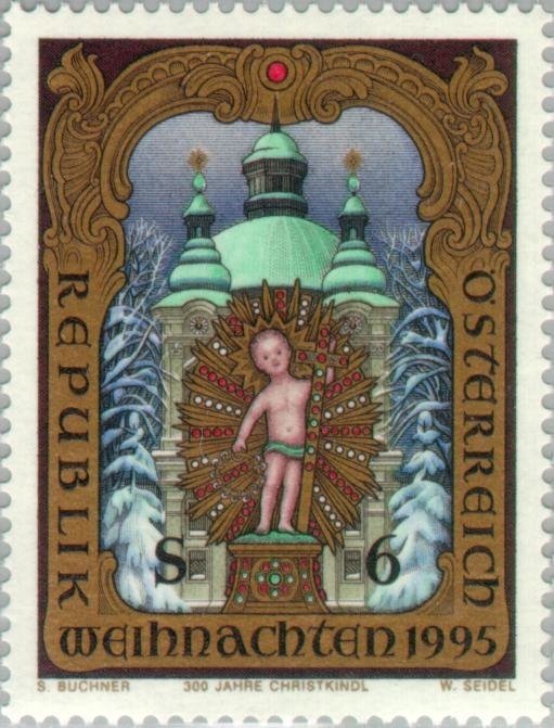 Mother in front of barbed wire