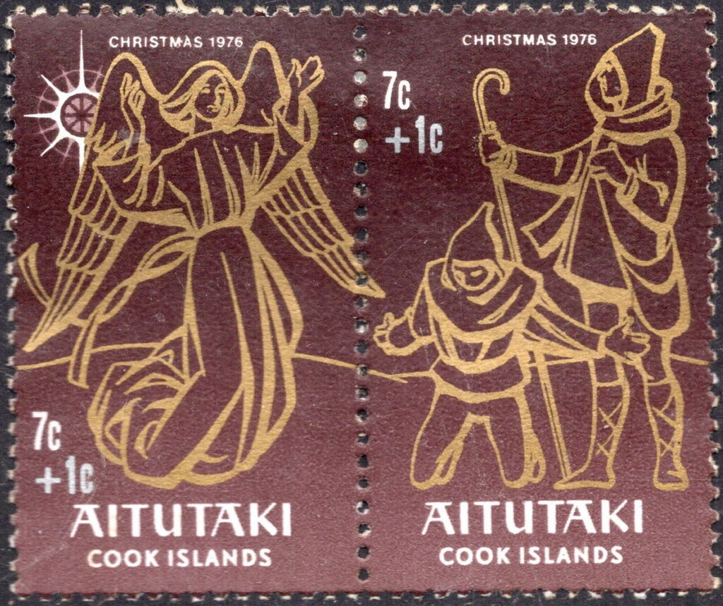 Woman behind barbed wire, chain, hands unlocking lock