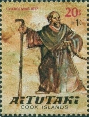 Olympic torch and Cook Island canoes