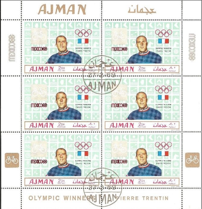 Sandy beach with leaning palm tree and island