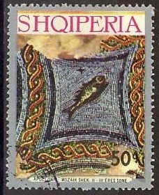 ‭Bricklayer, flag, globe and “Industry”