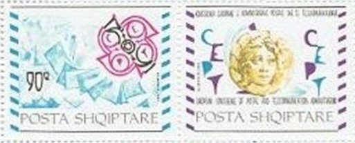 ‭‭Olympic Rings and Runner at Finish Line