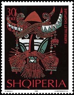 ‭NATO emblem, Buildings, and Albanian flag