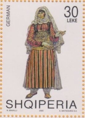 Hand holding rifle, globe, broken swastika