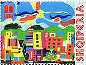 ‭‭Olympic Rings and Runner at Finish Line