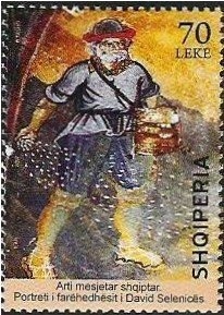 ‭NATO emblem, Buildings, and Albanian flag