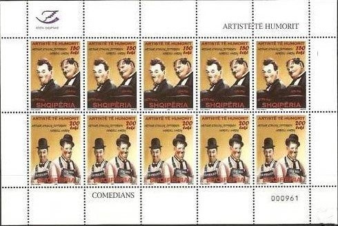 Children with rifle, ax, book and flags