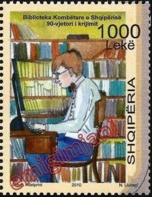 Castle on mountain, people near river