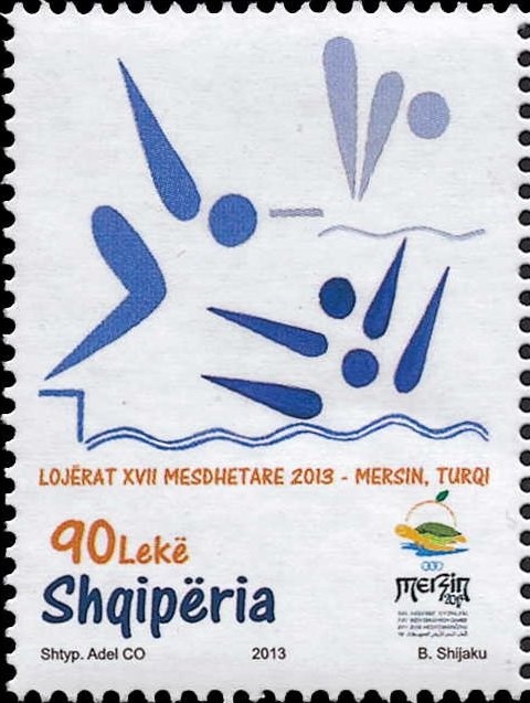 Boy Pointing to Flags