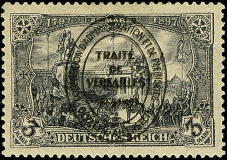 Coat of arms (stone carving) at the old town hall of Andorra