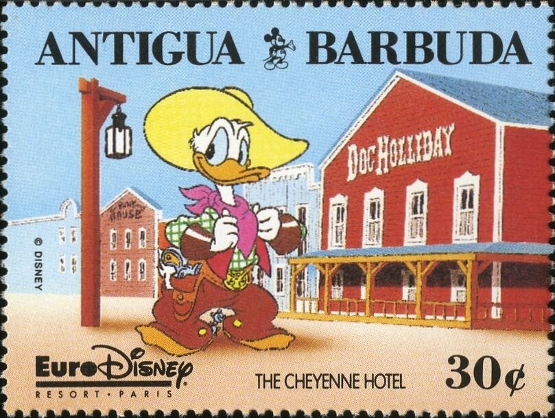 With Prince Charles at his Christening, 1948