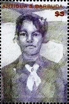 John Lennon in Cap with Heart Badge