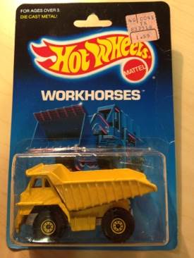 CAT Dump Truck - Hot Wheels Workhorses toy car collectible - Main Image 1