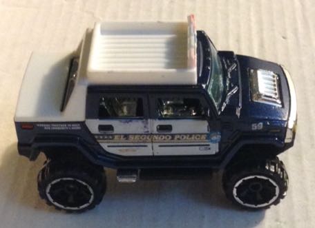 Hummer H2 Policia Azul  Llantas Grandes - Hot Wheels toy car collectible - Main Image 1