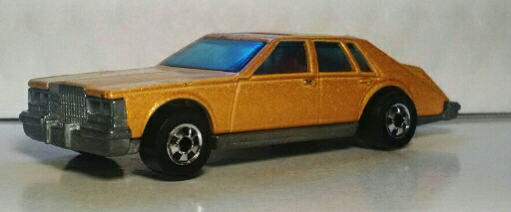 Cadilac Seville - 1983 Hot Wheels Hot Ones toy car collectible - Main Image 1