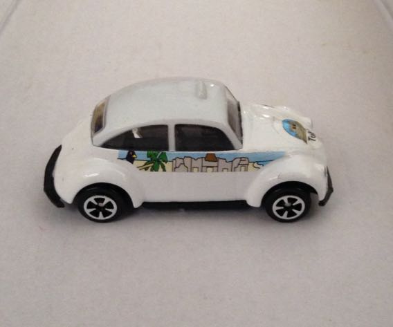 Taxi Chico Volkswagen Blanco Tulum - Gashaball toy car collectible - Main Image 2