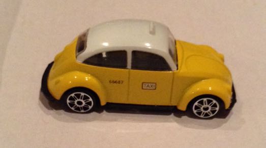 Taxi Chico Volkswagen Sedan Amarillo Oscuro Df  - Gashaball toy car collectible - Main Image 2