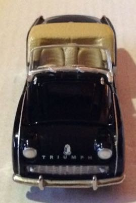 Triumph Convertible Negro - Johnny Lightning toy car collectible - Main Image 1