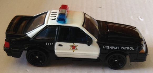 1987 Ford Mustang Patrulla - Johnny Lightning toy car collectible - Main Image 2