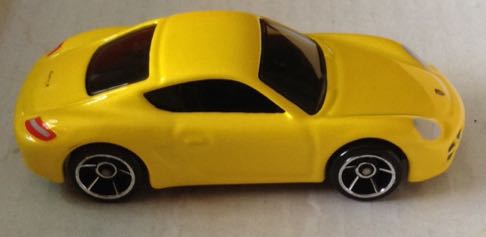 Porsche Cayman S Amarillo - Hot Wheels toy car collectible - Main Image 2