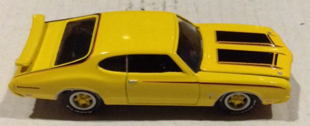 Olds Cutlass Amarillo - Johnny Lightning toy car collectible - Main Image 2