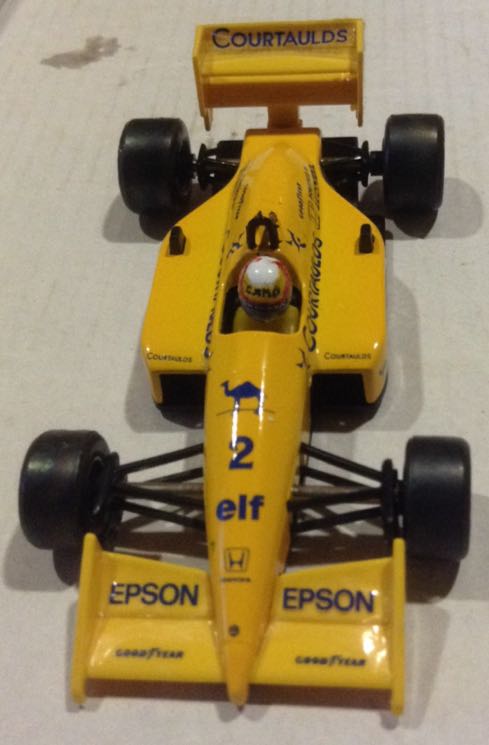 Motoneta Roja Tomica