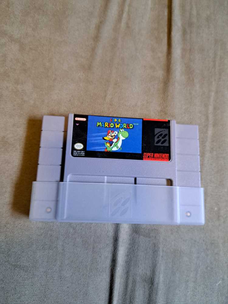 SNES: Super Mario World - Nintendo Super Nintendo Entertainment System (SNES) (Nintendo) video game collectible - Main Image 1